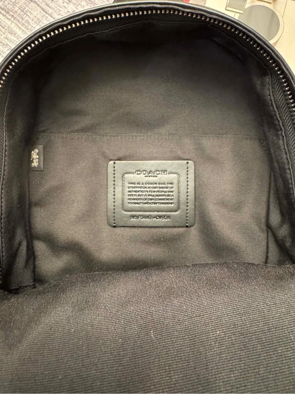 Coach signature coated